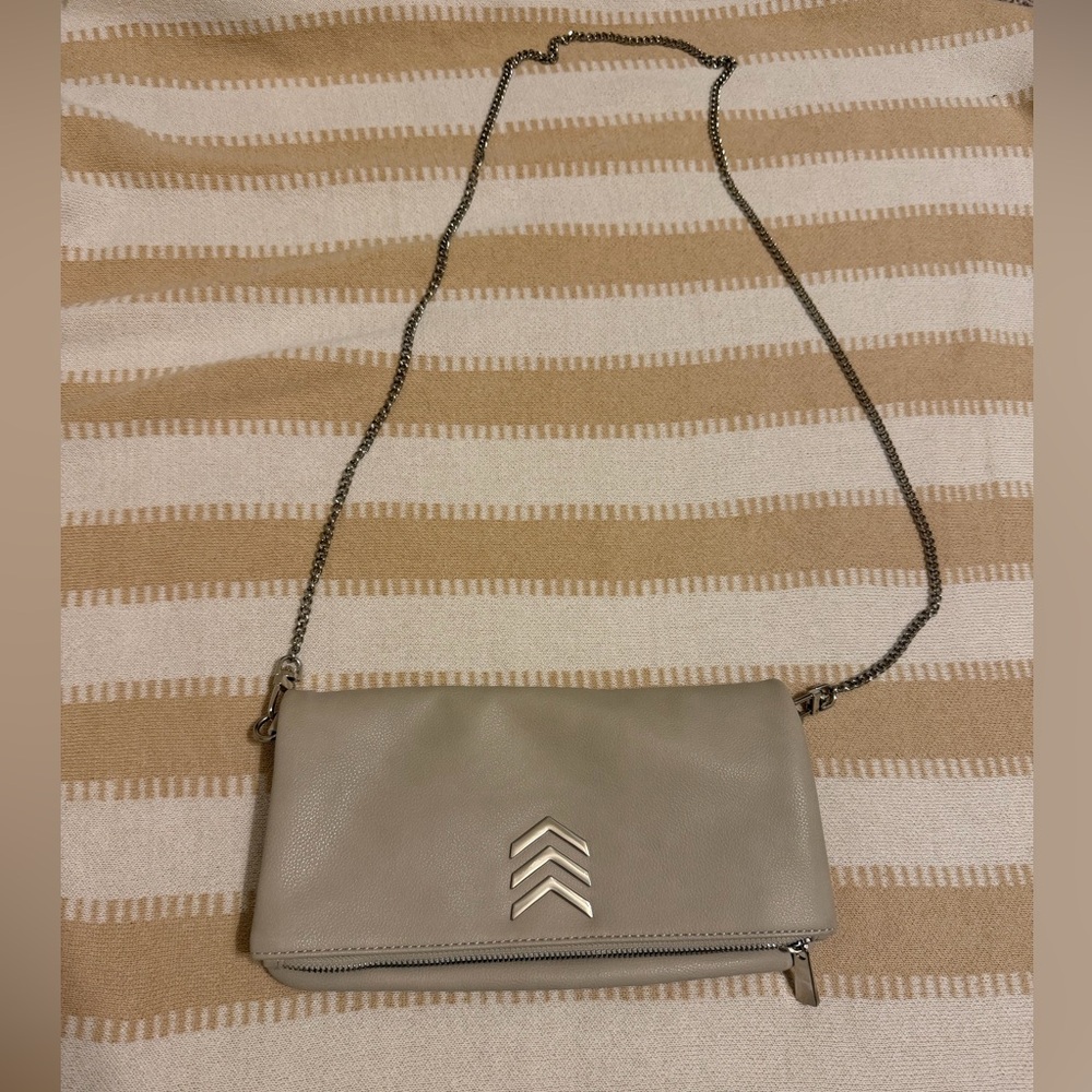 Express Cream Crossbody Bag with silver chain shoulder strap